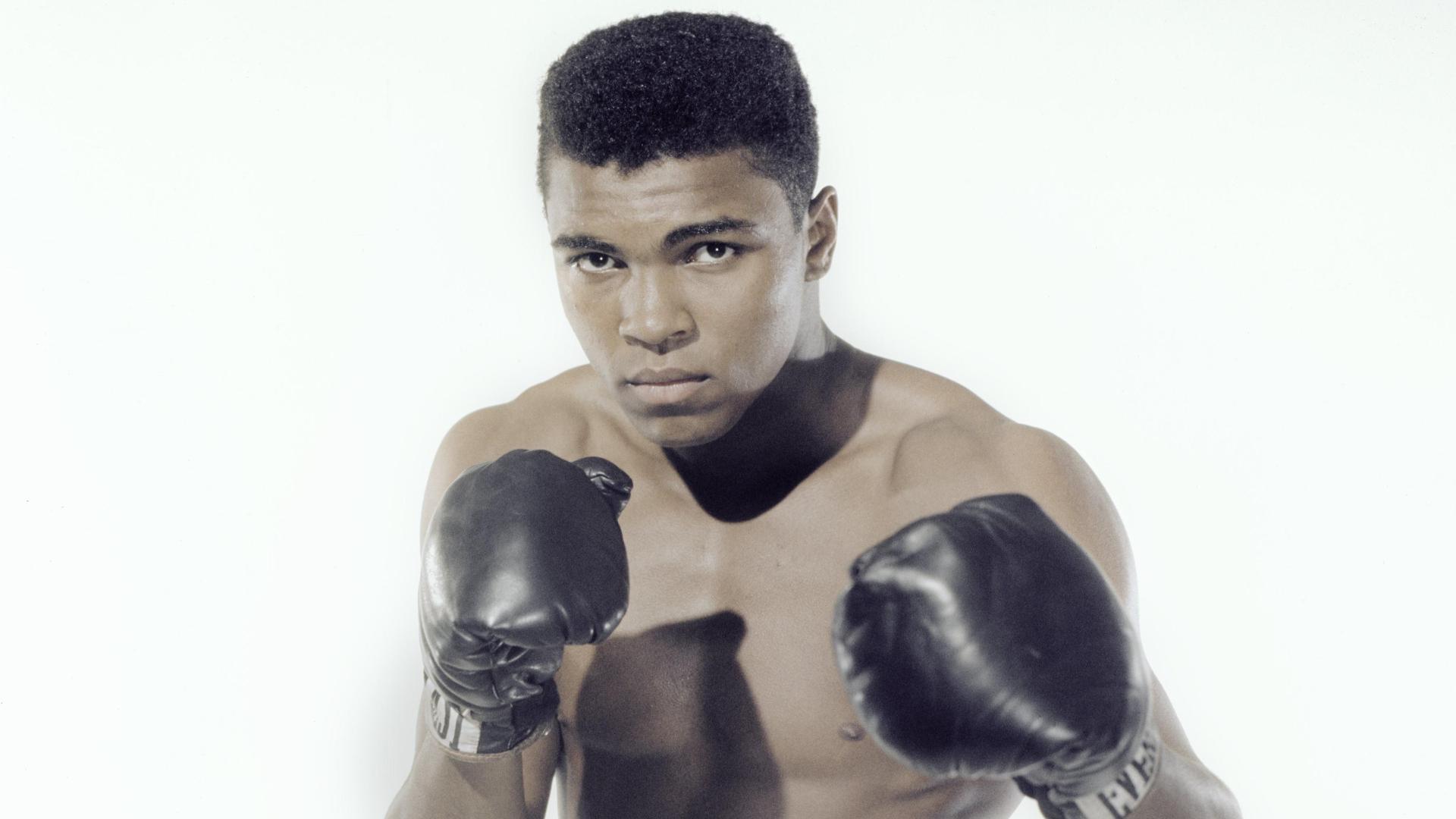 Muhammad Ali picture wearing boxing gloves